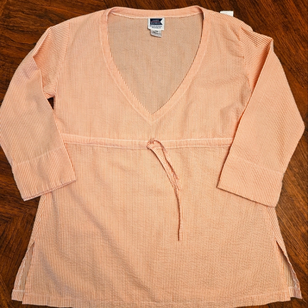Light orange and white seersucker blouse, size xs made in USA 100%cotton